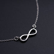 Elegant Silver Necklace Featuring a Stunning Infinity Pendant